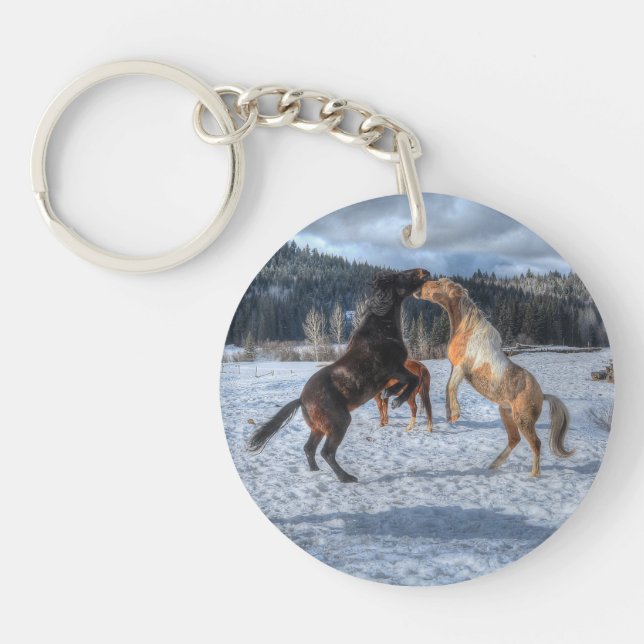 Two Ranch Horses Playfighting in Winter Snow IV Keychain (Front)