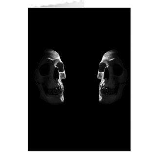 Two real smiling skulls cards