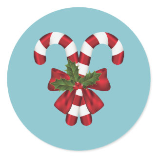 Two Red And White Candy Canes On Blue Classic Round Sticker