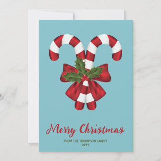 Two Red And White Candy Canes On Blue With Text Holiday Card