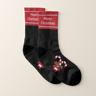 Two Red And White Festive Candy Canes On Black Socks