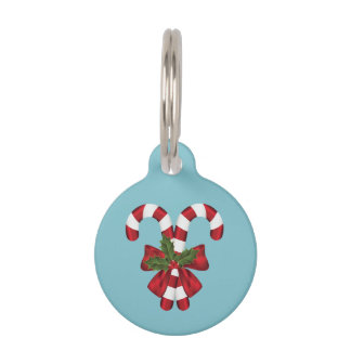 Two Red And White Festive Candy Canes On Blue Pet ID Tag