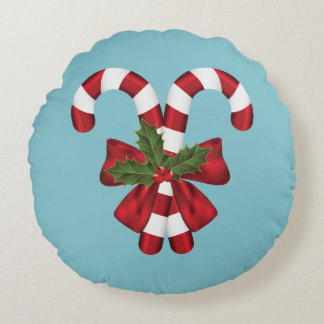 Two Red And White Festive Candy Canes On Blue Round Pillow