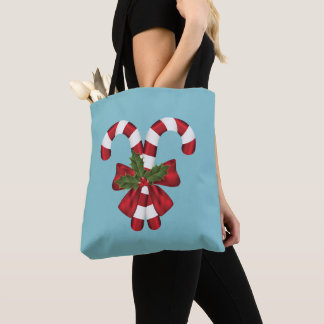 Two Red And White Festive Candy Canes On Blue Tote Bag