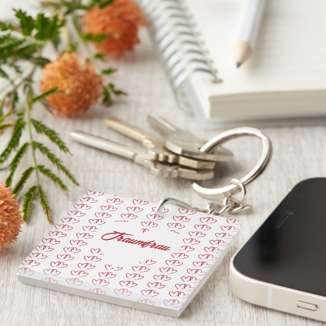 Two red connected hearts -  keychain (Front Right)