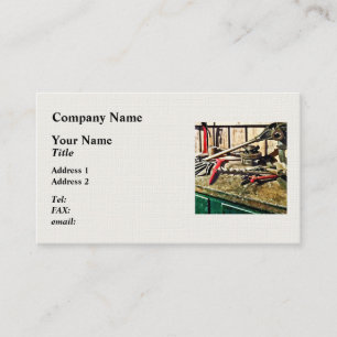 Two Red Wrenches on Plumber's Workbench Business Card