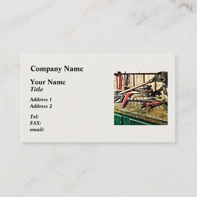 Two Red Wrenches on Plumber's Workbench Business Card (Front)