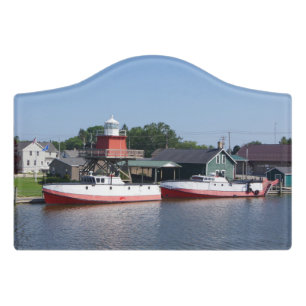 Two Rivers Lighthouse & Boats sign