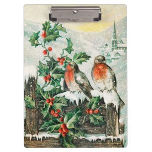 Two robins on a fence in the snow clipboard