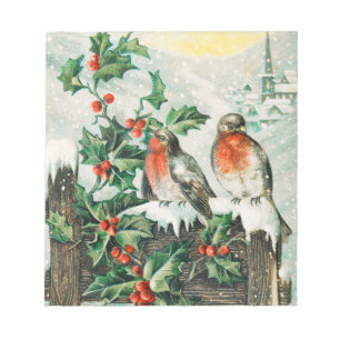Two robins on a fence in the snow notepad