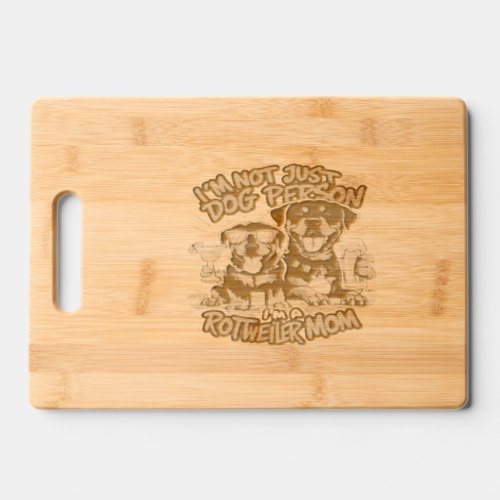 Two Rottweiler Dogs Sitting Together Cutting Board