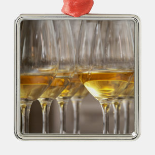two rows of wine tasting glasses with lucious metal ornament