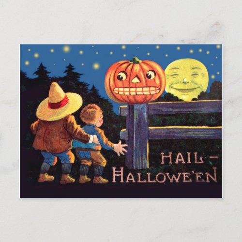 Two scared kids on Halloween night Postcard