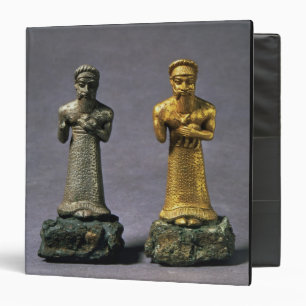 Two statuettes of men carrying offerings of goats, 3 ring binder