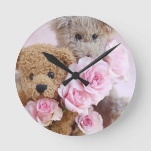 two teddy bears holding roses clock