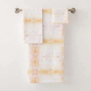 Two towels hang on a silver bar: a larger towel 