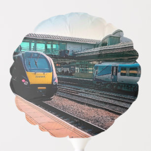 Two trains at the station balloon