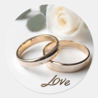Two wedding rings on satin with love classic round sticker
