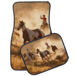 Two western cowboys riding horses, roping wild hor car floor mat