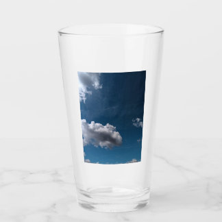 Two white clouds , on a blue sky glass