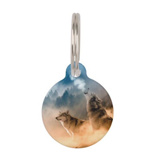 Two wolves howl at the full moon in forest pet ID tag