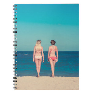 TWO WOMEN WEARING BIKINI STANDING ON SHORE NOTEBOOK