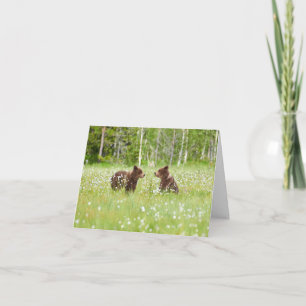 Two young brown bear friends folded greeting card