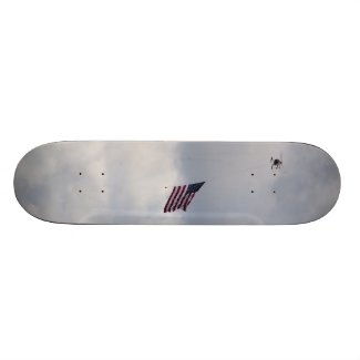 U.S.A flag carried by a helicopter on a skateboard