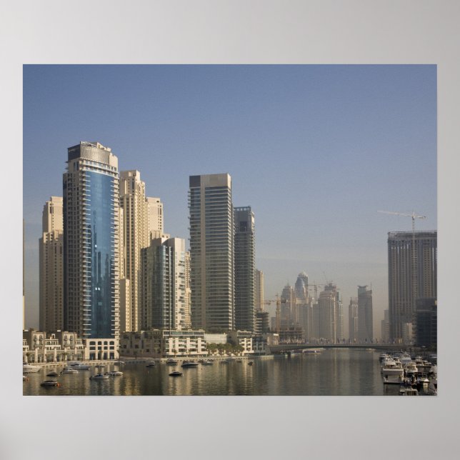 UAE, Dubai. Marina towers with boats at anchor. Poster (Front)
