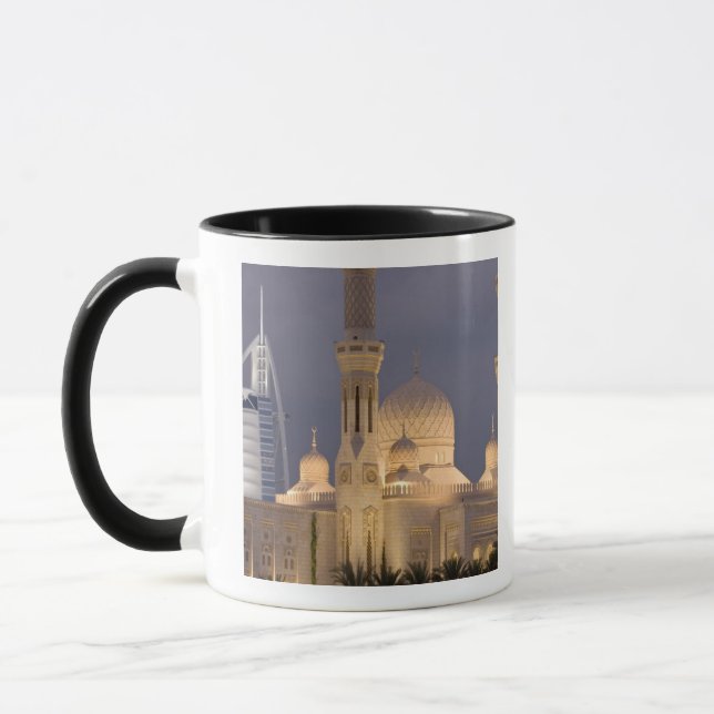 UAE, Dubai. Mosque in evening with Burj al Arab Mug (Left)