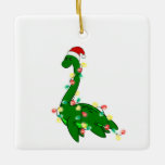 ugly christmas santa Loch ness Monster Ceramic Ornament<br><div class="desc">ugly christmas santa Loch ness Monster

"christmas santa Loch ness Monster" , "Loch ness Monster" , "Lochness Monster", "santa claus" , "ugly christmas", " santa claus hat" , nessie, Monster,  christmas,  santa</div>