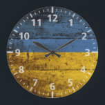Ukraine Flag on Old Wood Grain Large Clock<br><div class="desc">Feel free to modify the design according to your own preferences. You may change the design location, orientation, background colors and size. Also, you may add your own text, or slogan set its font, location and size, all in order to create the ultimate personal gift for you and your loved...</div>