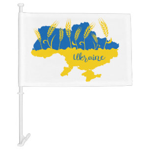 Ukraine typography and wheat ear on Ukrainian flag