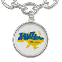 Ukraine typography and wheat ear on Ukrainian flag