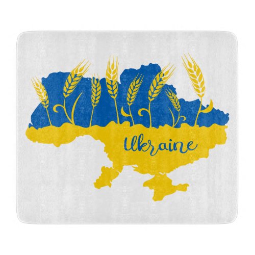 Ukraine typography and wheat ear on Ukrainian flag Cutting Board