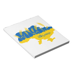 Ukraine typography and wheat ear on Ukrainian flag Notepad
