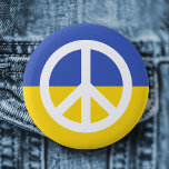 Ukrainian flag peace symbol Ukraine anti war Button<br><div class="desc">Ukraine anti war button featuring a white peace symbol on a blue and yellow ukranian flag background.</div>