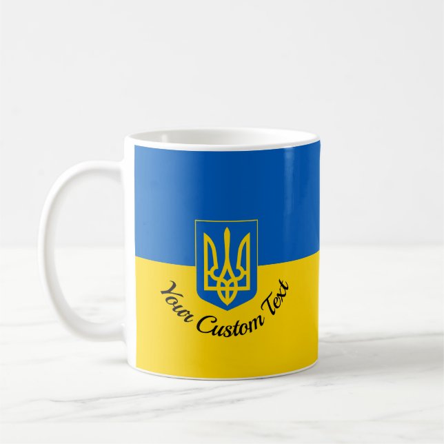 Ukrainian flag with coat of arms and custom text coffee mug (Left)