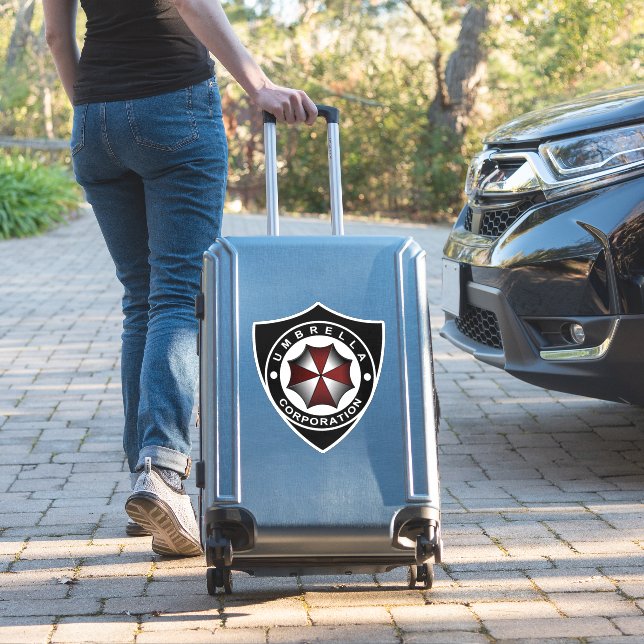 Umbrella Corp Shield Sticker (Suitcase Insitu)