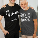 UNCLE of the GROOM T-Shirt<br><div class="desc">The groom might have a cousin who will want to show his stature at his cousin's wedding day. Text says UNCLE of the GROOM. The same text and color repeats on the back of this t-shirt. The text is an image so that the color can be changed to any you...</div>