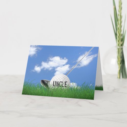 Uncle's birthday golf ball in grass