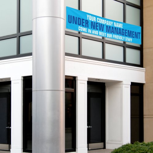 Under new management business signage blue banner