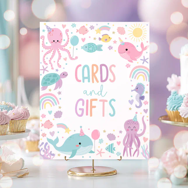 A pastel colored background with the sign in main focus. There are pink and purple octopi, a green and pink whale, and other pastel colored illustrations in various shades.