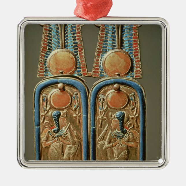 Unguent box in form of a double royal metal ornament (Front)