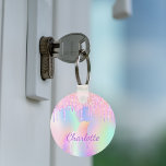 Unicorn glitter rainbow monogram name holographic keychain<br><div class="desc">A trendy holographic background with unicorn and rainbow pastel colors in pink,  purple,  rose gold,  mint green. Decorated with faux glitter drips in rose gold,  pink and purple. Personalize and add your name.  Purple colored letters.  A bit of everyday glam to brighten up your day!</div>