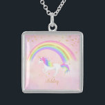 Unicorn necklace with magical pink gold glitter<br><div class="desc">Unicorn necklace with magical pink,  gold glitter and rainbow colors! Text in gold with a rainbow unicorn against a soft pastel pink background.  Perfect gift for the unicorn lover in your life.   Change the background color if you like!</div>
