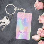 Unicorn pink glitter drips name holographic keychain<br><div class="desc">A trendy holographic background with unicorn and pastel colors in pink,  purple,  mint green. Decorated with faux glitter drips,  paint dripping look. Personalize and add your name.  Purple colored letters.  A bit of everyday glam to brighten up your day!</div>