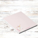 Unicorn pink name girl notepad<br><div class="desc">A cute pink and golden unicorn head.  A soft,  blush pink background. Personalize and add your name.  Pink letters.</div>