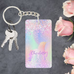 Unicorn pink purple name holographic keychain<br><div class="desc">A trendy holographic background with unicorn and pastel colors in pink,  purple,  mint green. Decorated with faux glitter. Personalize and add your name.  Purple colored letters.  A bit of everyday glam to brighten up your day!</div>