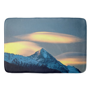 Unique Clouds Over Snow Covered Mountains Bath Mat